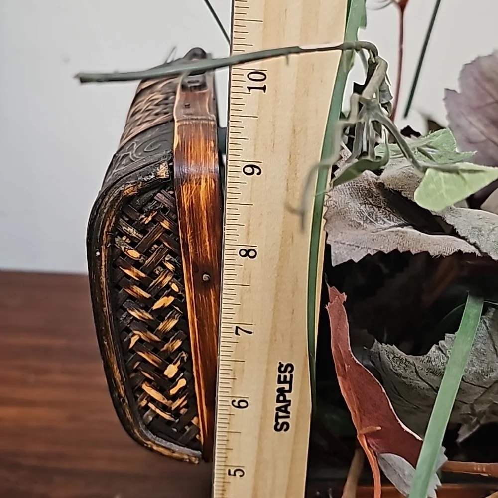 Vintage faux plant in wooden chest box decoration